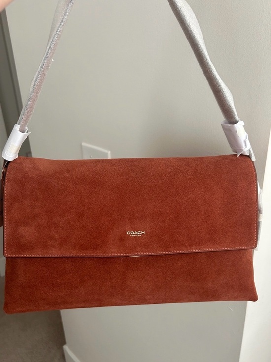 Coach Handbags - Coach chelsea 36 in suede clay / brass